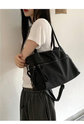 Nuts big zip pocket black shoulder bag