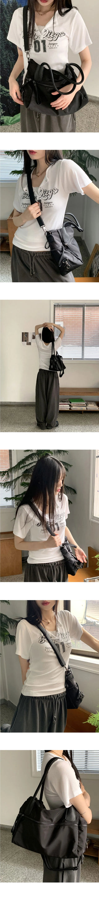 Nuts big zip pocket black shoulder bag