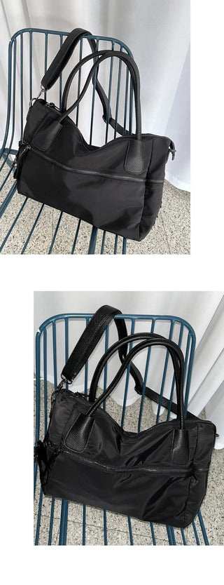 Nuts big zip pocket black shoulder bag