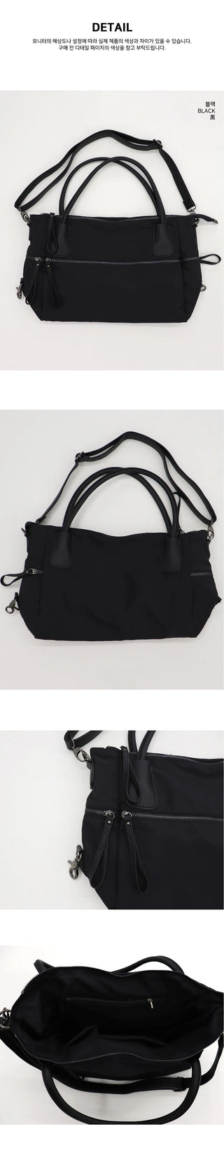 Nuts big zip pocket black shoulder bag