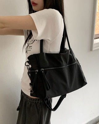 Nuts big zip pocket black shoulder bag