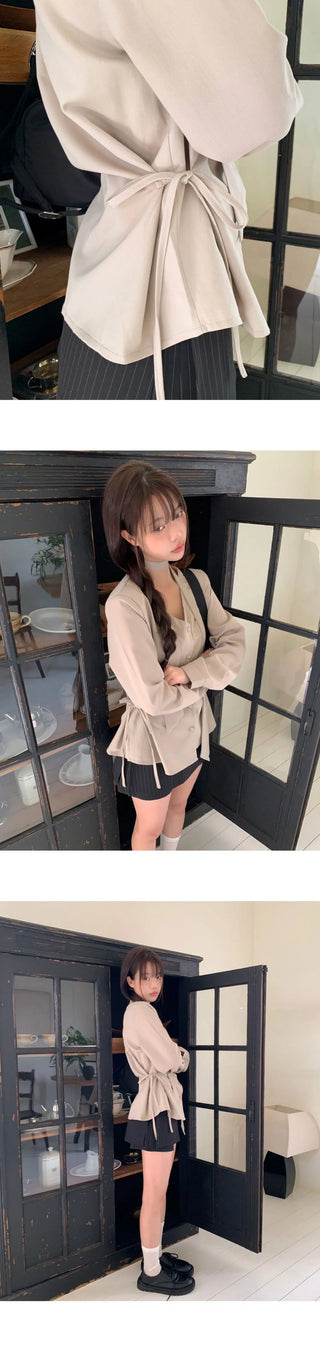 Ir bean button side strap V-Neck long sleeve blouse