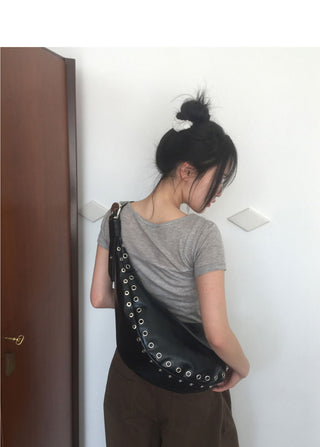 Retained eyelet leather cross shoulder bag