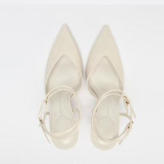 white patent pumps