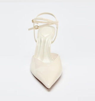 white patent pumps