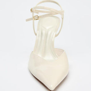 white patent pumps