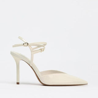white patent pumps