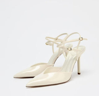 white patent pumps