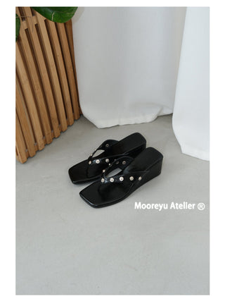 black rivet flip-flops