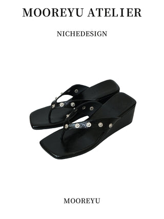 black rivet flip-flops