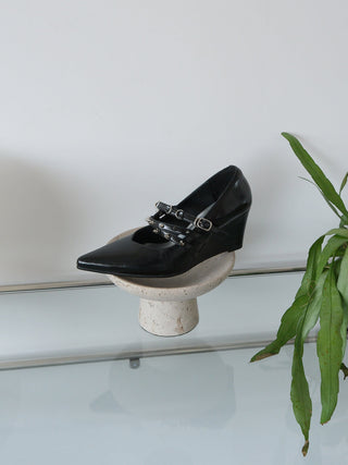 black pointed heels