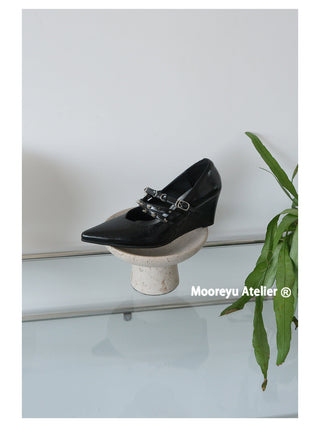 black pointed heels