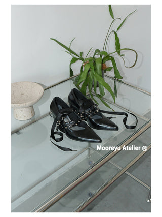 black pointed heels