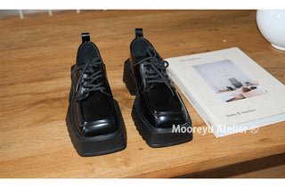 black square loafers