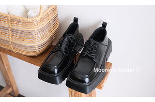 black square loafers