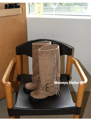 distressed tassel boots