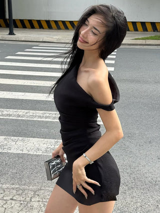 pleated black dress