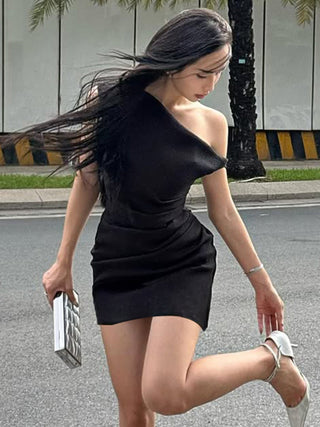 pleated black dress
