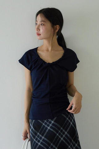 pleated sleeveless top