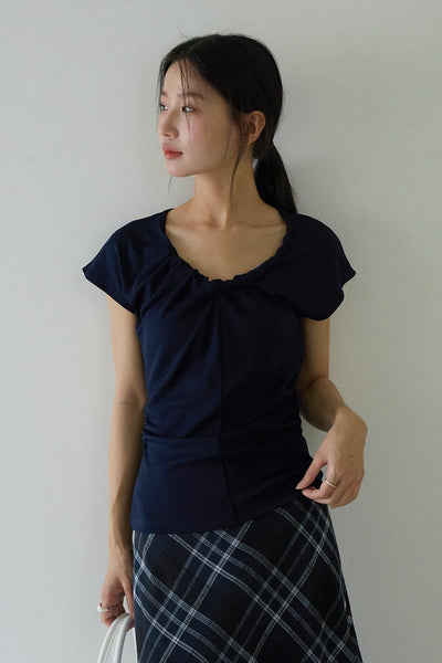 pleated sleeveless top