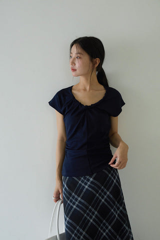 pleated sleeveless top