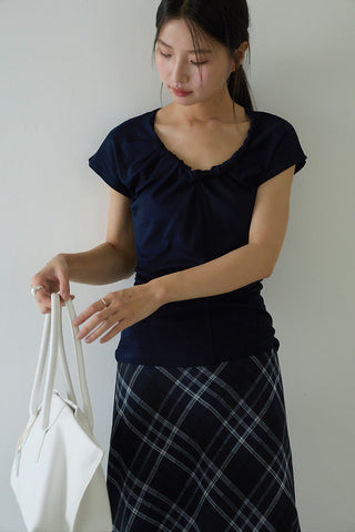 pleated sleeveless top