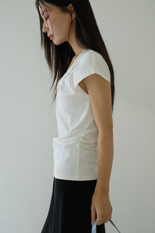 pleated sleeveless top