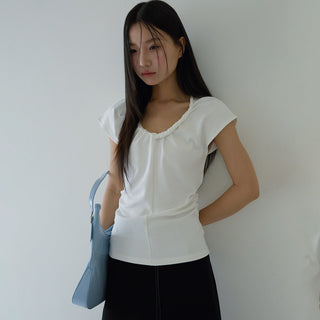 pleated sleeveless top