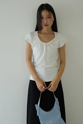 pleated sleeveless top
