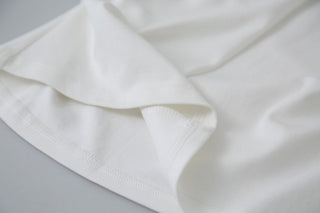 pleated sleeveless top