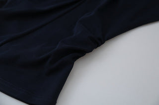 pleated sleeveless top