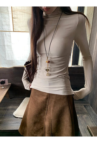 beige suede skirt