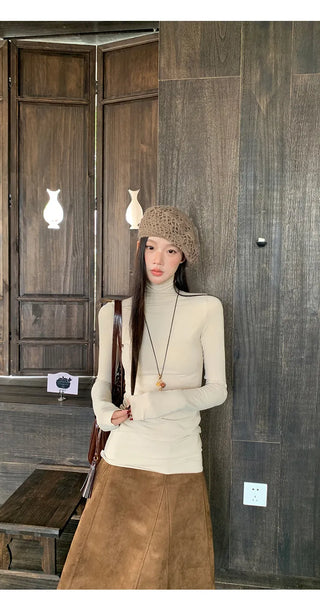 beige suede skirt