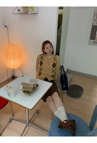 yellow knit cardigan