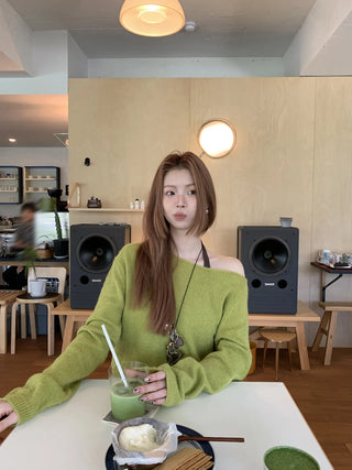 green diagonal sweater