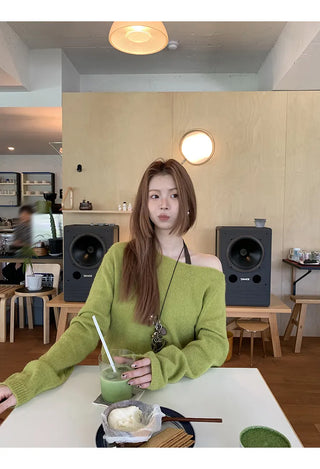 green diagonal sweater