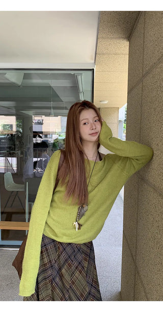 green diagonal sweater