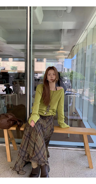 green diagonal sweater