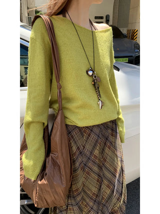 green diagonal sweater