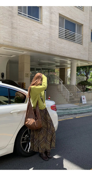 green diagonal sweater