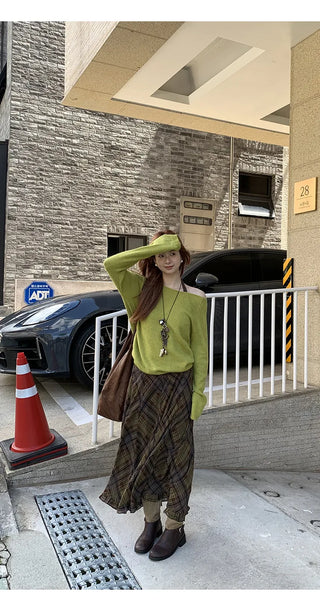 green diagonal sweater