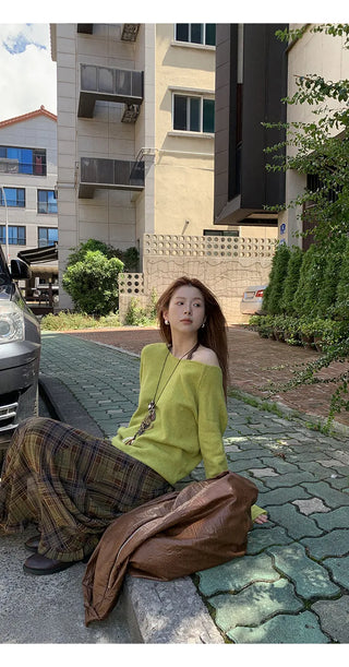 green diagonal sweater