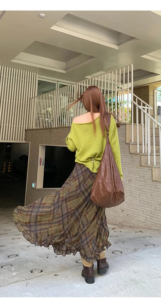 green diagonal sweater