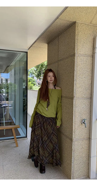 green diagonal sweater