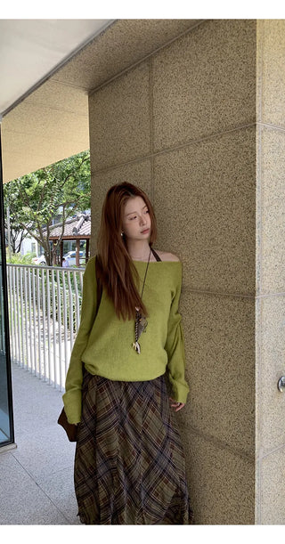 green diagonal sweater