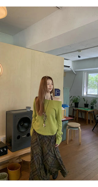 green diagonal sweater