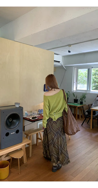 green diagonal sweater