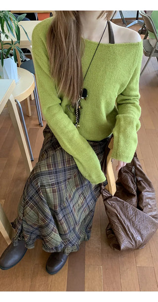 green diagonal sweater