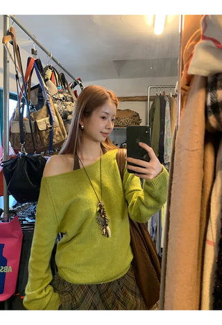 green diagonal sweater