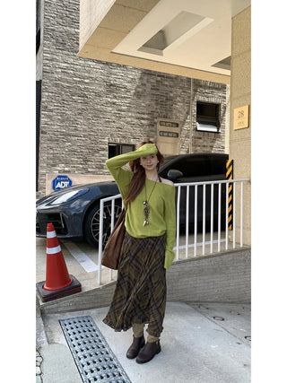 green diagonal sweater